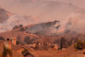 Wildfire surrounding neighborhood